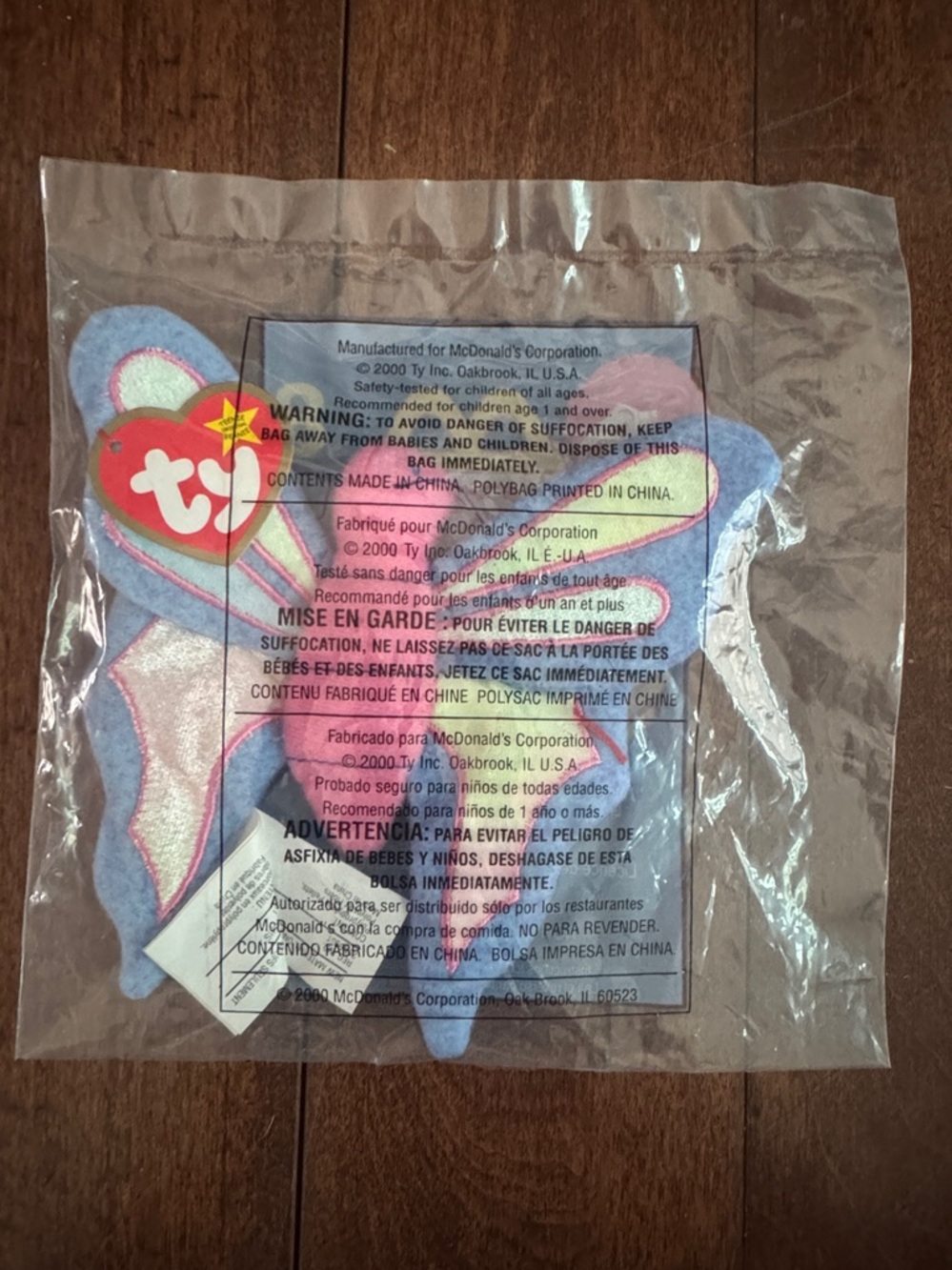 "Ty Teenie Beanie Baby" in original packaging. "Flitter" the Butterfly. Rare